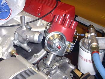 Distributor next to thermostat housing