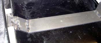 Tack-welded exhaust mounting