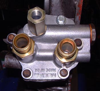 Ported oil pump cover