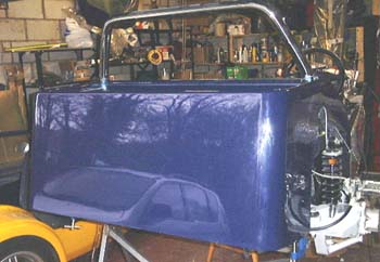 Mirror attached to back of car