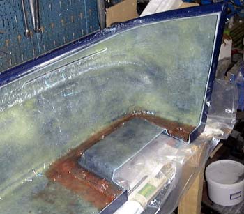 Bonded in pedal clearance moulding